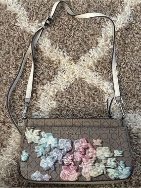 Calvin Klein Brown Floral Logo Crossbody with Multicolor Blooms